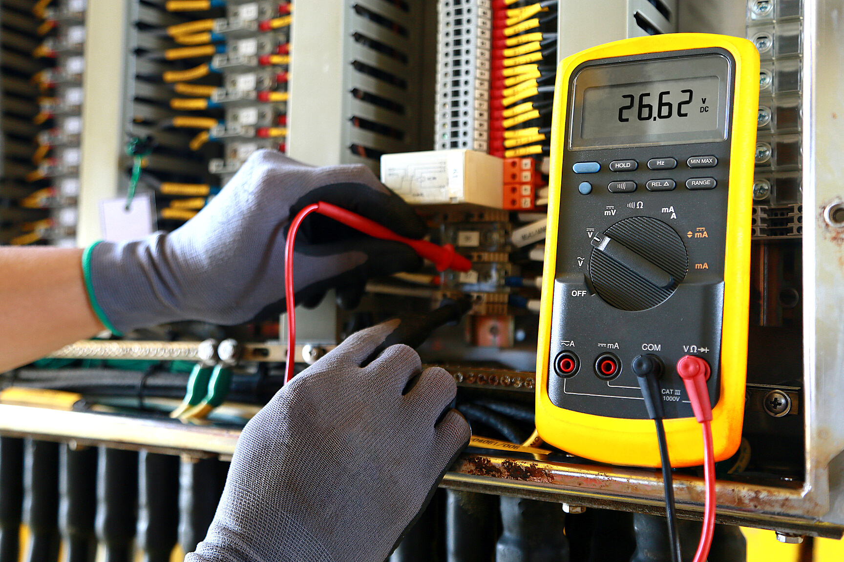 Electrical terminal in junction box and service by technician. Electrical device install in control panel for support program and control function by PLC. routine visit check equipment by technician.